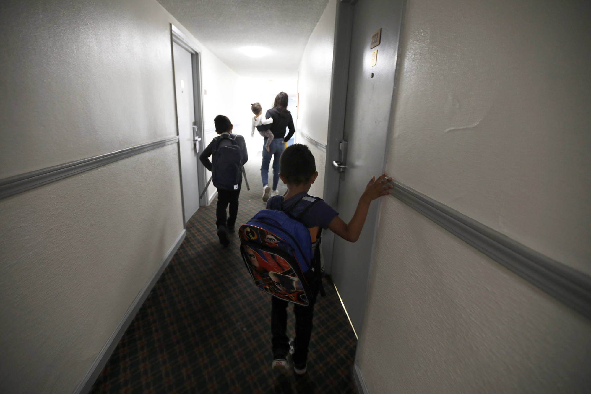 Whether home is a van, a motel or a garage, L.A.’s suburban poor children learn to survive