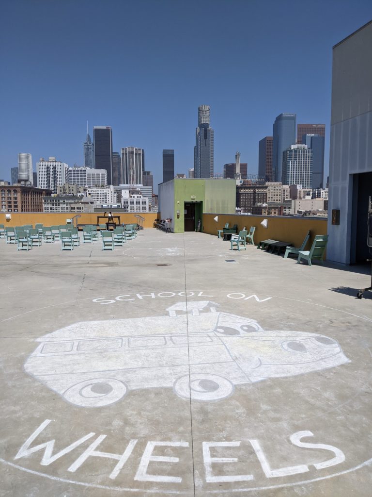 Union Rescue Mission rooftop featuring School on Wheels logo