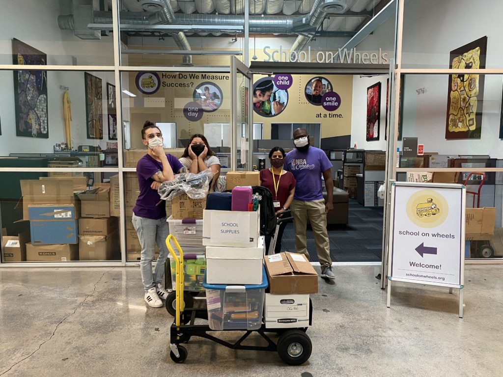 Volunteers drop off supplies at our Fletcher office